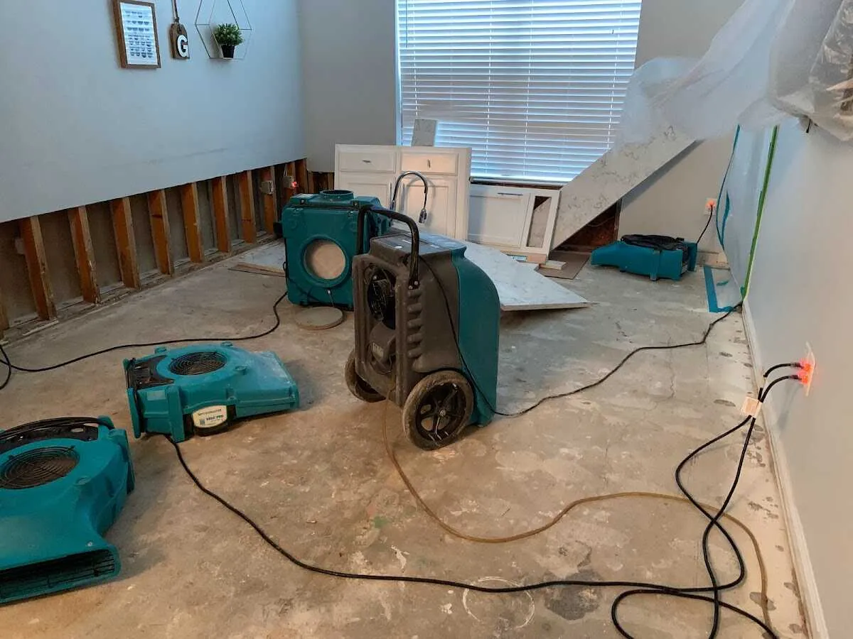Dehumidifier in flood-cut room for Water Damage Restoration in Gardendale